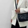 Sac Bandoulière Femme Multi-Poches – Spacieux, Chic et Pratique (Idéal Sac de Maman). Alliez élégance et fonctionnalité au quotidien avec ce sac à épaule à la fois chic et décontracté.