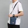Nouveau mini sac de voyage multifonctionnel et léger pour téléphone et activités en plein air.
