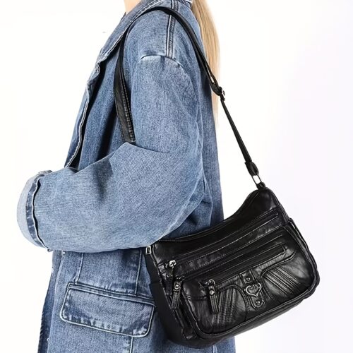 Sac Bandoulière Rétro pour Femme Laissez-vous séduire par ce nouveau sac à bandoulière au charme rétro irrésistible, pensé pour sublimer toutes vos tenues avec une touche d'élégance intemporelle.