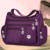 Sac Bandoulière Carré Unisexe en Tissu Oxford Alliez style et praticité avec ce sac à épaule unique grand format, conçu pour les hommes et les femmes.