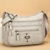 Sac Bandoulière Rétro pour Femme Laissez-vous séduire par ce nouveau sac à bandoulière au charme rétro irrésistible, pensé pour sublimer toutes vos tenues avec une touche d'élégance intemporelle.