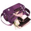 Sac Bandoulière Carré Unisexe en Tissu Oxford Alliez style et praticité avec ce sac à épaule unique grand format, conçu pour les hommes et les femmes.