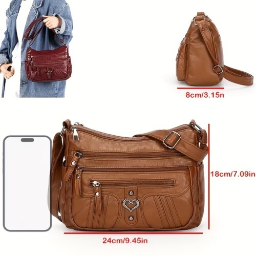 Sac Bandoulière Rétro pour Femme Laissez-vous séduire par ce nouveau sac à bandoulière au charme rétro irrésistible, pensé pour sublimer toutes vos tenues avec une touche d'élégance intemporelle.