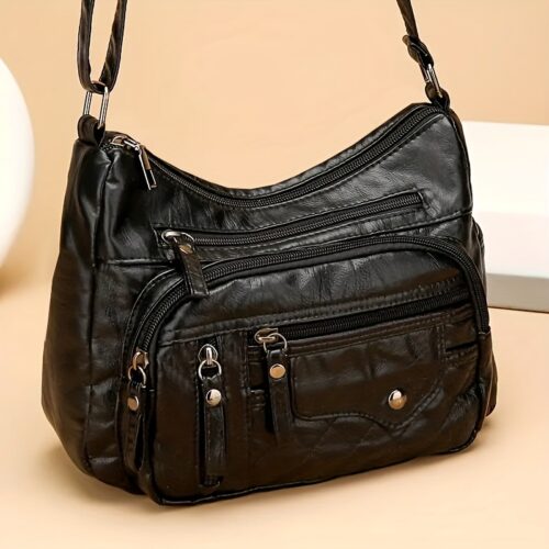 Sac Messager Unisexe "Automne-Hiver" : Le Cadeau Idéal de Noël. Un sac bandoulière tendance, pratique et mixte, avec des zips multiples au look décontracté et original.