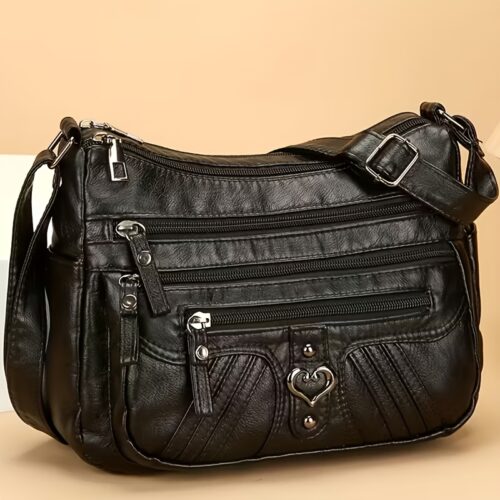 Sac Bandoulière Rétro pour Femme Laissez-vous séduire par ce nouveau sac à bandoulière au charme rétro irrésistible, pensé pour sublimer toutes vos tenues avec une touche d'élégance intemporelle.