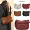 Sac Bandoulière Rétro pour Femme Laissez-vous séduire par ce nouveau sac à bandoulière au charme rétro irrésistible, pensé pour sublimer toutes vos tenues avec une touche d'élégance intemporelle.