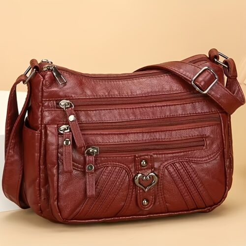 Sac Bandoulière Rétro pour Femme Laissez-vous séduire par ce nouveau sac à bandoulière au charme rétro irrésistible, pensé pour sublimer toutes vos tenues avec une touche d'élégance intemporelle.