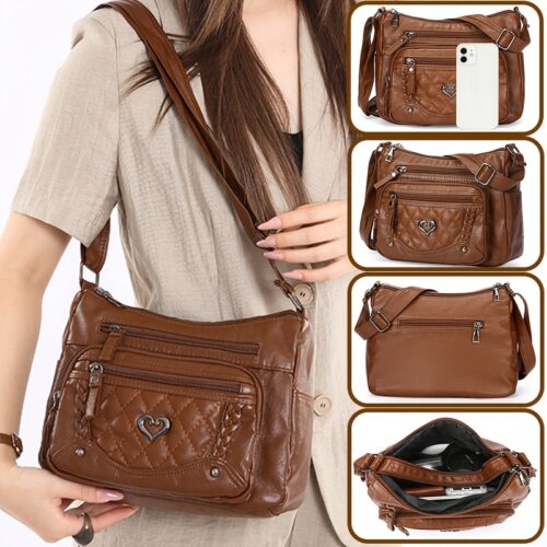 Sac à bandoulière tendance pour femme Un modèle uni et polyvalent, rehaussé d'un charmant détail en forme de cœur. Doté de multiples poches pratiques et d'une bandoulière facilement ajustable.