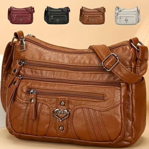 Sac Bandoulière Rétro pour Femme Laissez-vous séduire par ce nouveau sac à bandoulière au charme rétro irrésistible, pensé pour sublimer toutes vos tenues avec une touche d'élégance intemporelle.