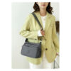 Sac Bandoulière Spacieux en Nylon Oxford L'allié chic et ultra-pratique des femmes et des mamans actives. Pensé pour les déplacements du quotidien ou les voyages.