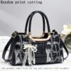 Sac à main pour femme adapté au travail et aux fêtes
